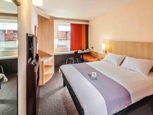 Ένα ή περισσότερα κρεβάτια σε δωμάτιο στο Ibis Praha Old Town +95 φωτογραφίες