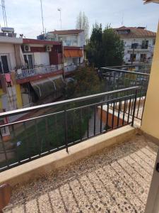 a balcony with a railing and some buildings at Central Michaniona AP in Nea Michaniona