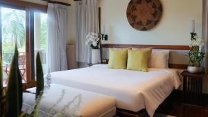 Ένα ή περισσότερα κρεβάτια σε δωμάτιο στο 普吉高端康养泳池别墅 +13 φωτογραφίες