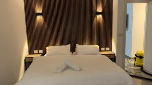 Ένα ή περισσότερα κρεβάτια σε δωμάτιο στο אחוזת חושן