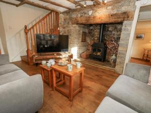 Et opholdsområde på Honeysuckle Cottage