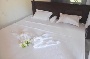 Ένα ή περισσότερα κρεβάτια σε δωμάτιο στο Dilaro house