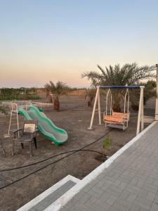 Ο χώρος παιχνιδιού για παιδιά στο Farm house with all facilities in Al Dhaid , sharjah