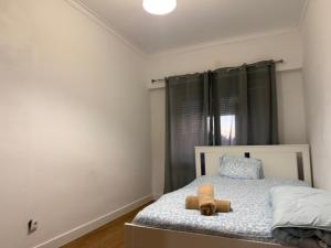 Ένα ή περισσότερα κρεβάτια σε δωμάτιο στο Bliss