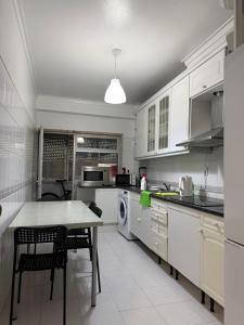 Η κουζίνα ή μικρή κουζίνα στο Bliss