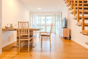 Телевизор и/или развлекательный центр в 3 Personen Apartment in Zentrum-Nähe +19 фотографий