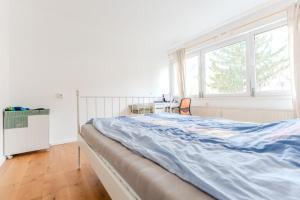 Кровать или кровати в номере 3 Personen Apartment in Zentrum-Nähe