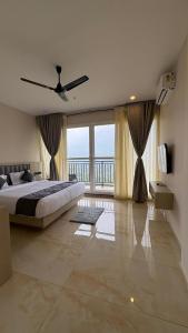 Ένα ή περισσότερα κρεβάτια σε δωμάτιο στο Misty Dale Luxury Resort & Spa +148 φωτογραφίες