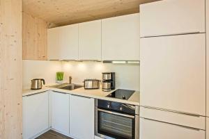 Η κουζίνα ή μικρή κουζίνα στο Seehaus Lütt Marten