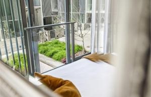 Postel nebo postele na pokoji v ubytování CBD luxury Apartments Balcony with Skytower View