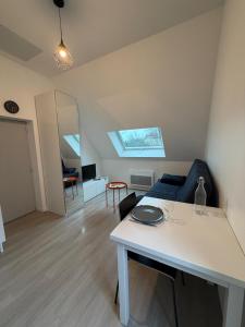 Χώρος καθιστικού στο Petit studio tout confort - proche Angers