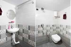 ein Badezimmer mit Toilette und Waschbecken in der Unterkunft HOTEL O KPS INN in Itwāri