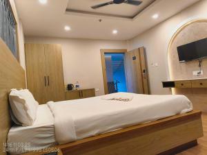 TV a/nebo společenská místnost v ubytování Collection O Bhubaneswar Industrial Estate Formerly Hotel Vrinda + 11 fotografií