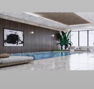 a rendering of a swimming pool in a building at TOROS BULVAR Cozy fancy Sea view next to the Beach and the Mall, in the mid of Alanya Mahmutlar! in Mahmutlar