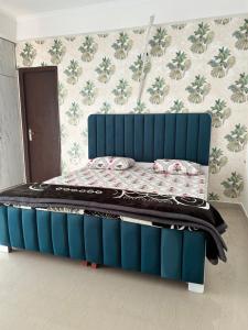 Postel nebo postele na pokoji v ubytování Grand palace