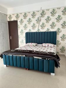 Postel nebo postele na pokoji v ubytování Grand palace