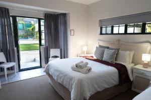 Кровать или кровати в номере Montagu Koo Karoo +62 фотографии