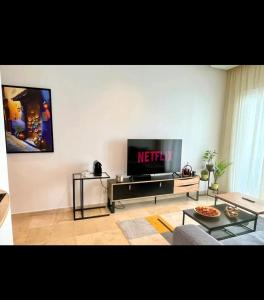 TV a/nebo společenská místnost v ubytování Mandela