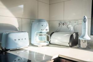 Η κουζίνα ή μικρή κουζίνα στο Blue Sunset Esentepe MUP