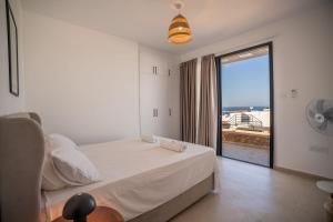 Ένα ή περισσότερα κρεβάτια σε δωμάτιο στο Blue Sunset Esentepe MUP +99 φωτογραφίες