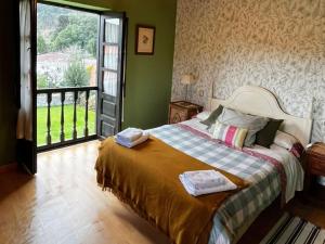 Ένα ή περισσότερα κρεβάτια σε δωμάτιο στο Casa Lula 2 Pendueles Llanes AR-685-AS