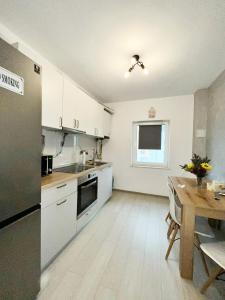 Η κουζίνα ή μικρή κουζίνα στο AmurResidence 531 private-Sauna free-parking