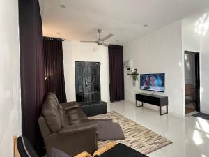 Μια τηλεόραση ή/και κέντρο ψυχαγωγίας στο Simpoh Inn