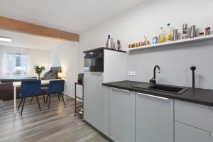 Una cocina o cocineta en Motel Ambiente 2 - Luxus Studio 9 fotos más