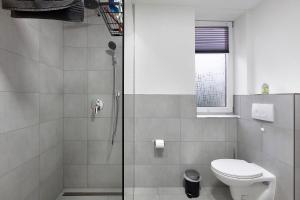 Un baño de Motel Ambiente 2 - Luxus Studio