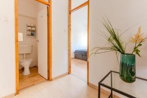 Koupelna v ubytování 4 Personen Apartment Nähe Zentrum + 28 fotografií