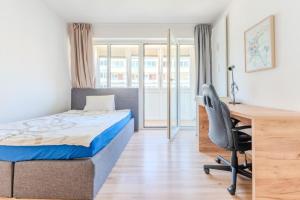 Postel nebo postele na pokoji v ubytování 4 Personen Apartment Nähe Zentrum