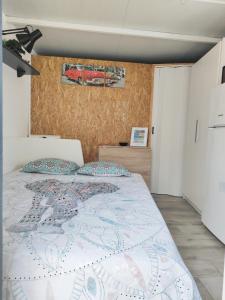 Ένα ή περισσότερα κρεβάτια σε δωμάτιο στο Coqueto Estudio en plena naturaleza en Río Grande +12 φωτογραφίες