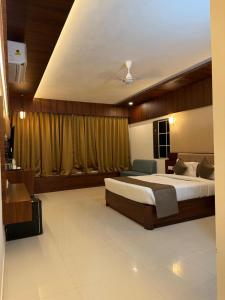 Postel nebo postele na pokoji v ubytování High Five Hotels