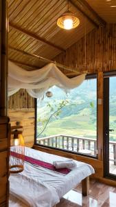 Postel nebo postele na pokoji v ubytování Mu Cang Chai Big view homestay, tour & vegetarian