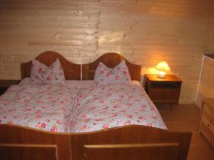 Ένα ή περισσότερα κρεβάτια σε δωμάτιο στο Romantik Hütte