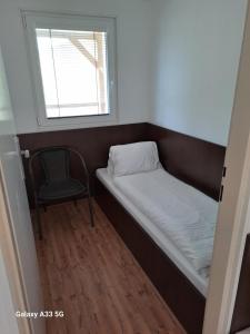 Ένα ή περισσότερα κρεβάτια σε δωμάτιο στο AUTO-AQUA-CYCLOCAMP OSTROŽSKÁ NOVÁ VES