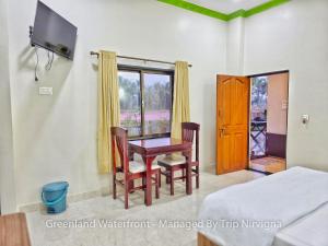 Μια τηλεόραση ή/και κέντρο ψυχαγωγίας στο Greenland Waterfront Kundapura