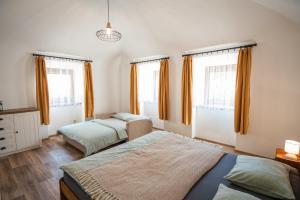 Postel nebo postele na pokoji v ubytování Apartmán u Rádich