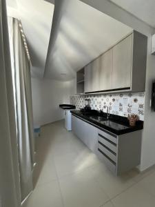 Nhà bếp/bếp nhỏ tại Marauí Guest House