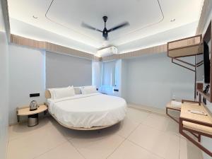 Ένα ή περισσότερα κρεβάτια σε δωμάτιο στο Hotel Nova Wave