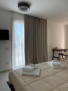 Ένα ή περισσότερα κρεβάτια σε δωμάτιο στο Borgo Nocchiara +35 φωτογραφίες