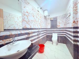 Koupelna v ubytování Bong Prince Near The New Digha Sea Beach