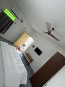 Giường trong phòng chung tại Ocean luxe inn +5 ảnh