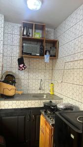 Η κουζίνα ή μικρή κουζίνα στο cozy furnished room