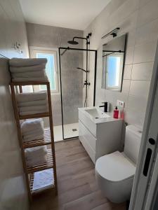 Ванная комната в Apartamento Bajo De Guía 1A