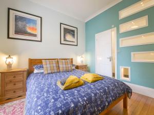 Postel nebo postele na pokoji v ubytování The Old Signal House