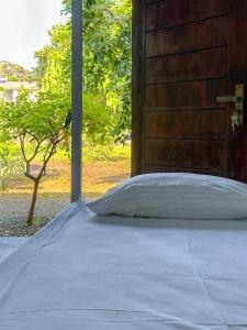 Ένα ή περισσότερα κρεβάτια σε δωμάτιο στο Vibra Hostel