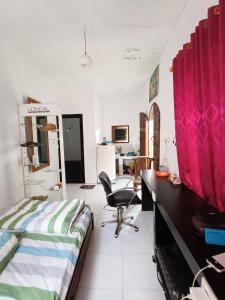 Ένα ή περισσότερα κρεβάτια σε δωμάτιο στο WiNHOUSE 2