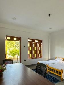 Ένα ή περισσότερα κρεβάτια σε δωμάτιο στο Vibra Hostel