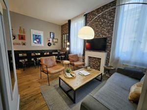 Χώρος καθιστικού στο Les Appartements de Champagne